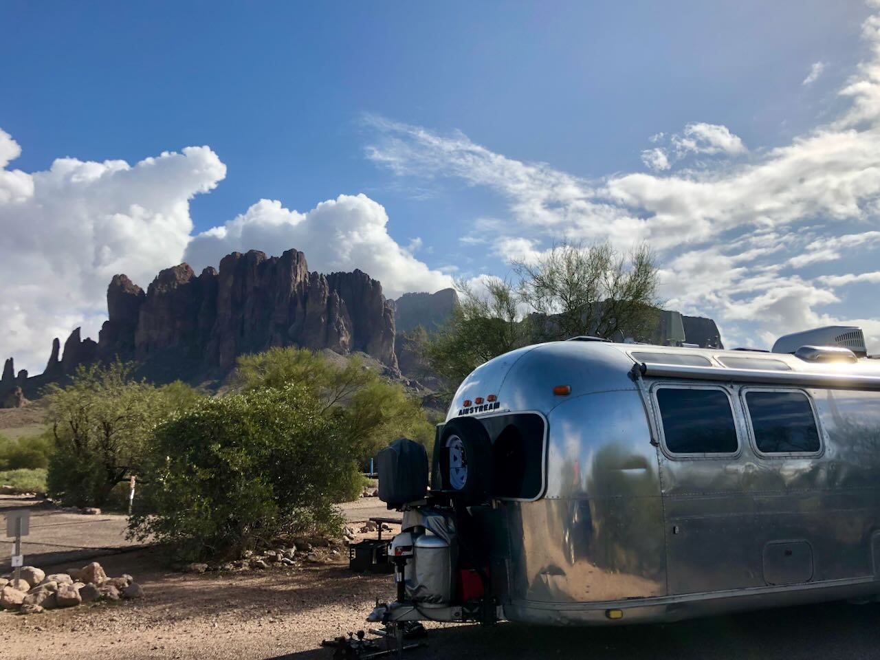 Camped beneath jagged desert peaks