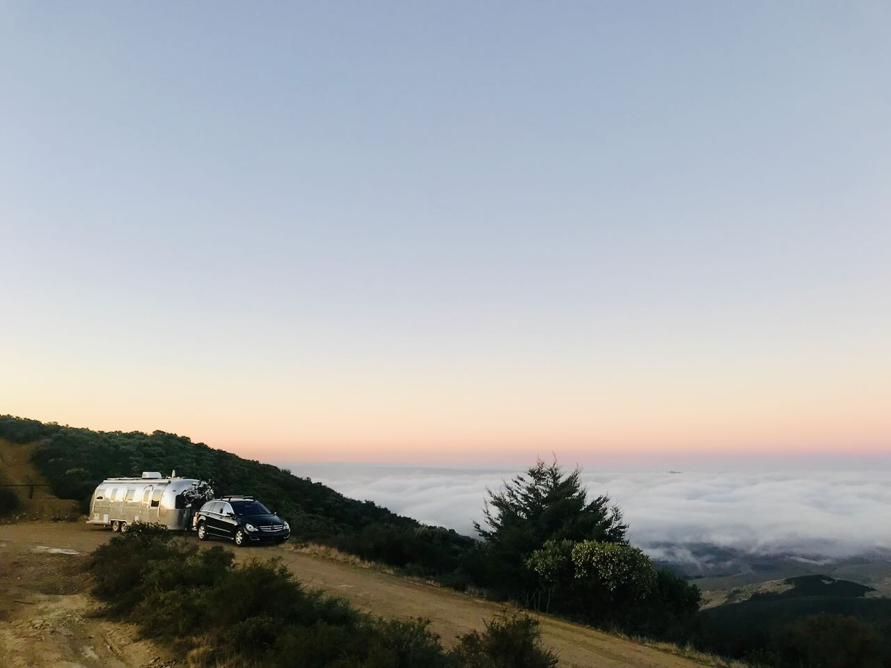 Dusk on a ridgeline above the fog